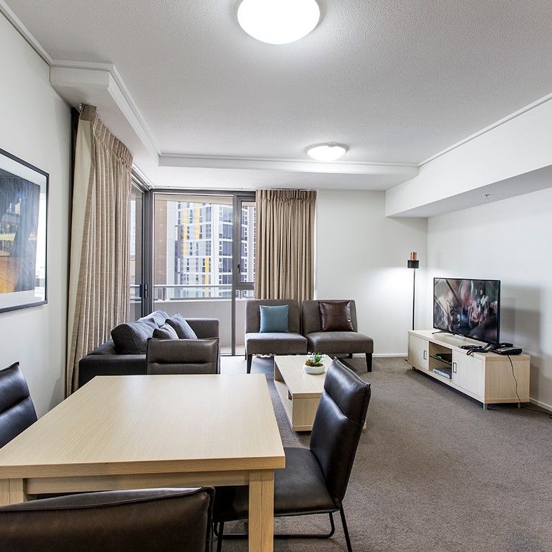 Fully Furnished with Utilities Included - Aurora Towers - Photo 1
