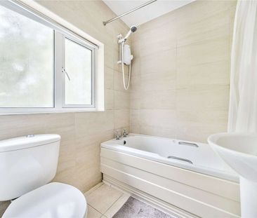 A deceptively spacious family home in a popular residential setting. - Photo 6