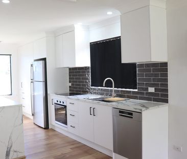 Beautifully renovated family home with huge shed - Photo 3