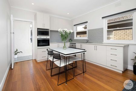 TASTEFULLY RENOVATED THREE BEDROOM HOME - Photo 2