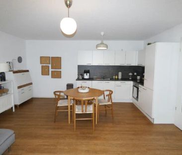 Gemütliche 2-Zimmer-Wohnung im Erdgeschoss mit Einbauküche und Terr... - Foto 1