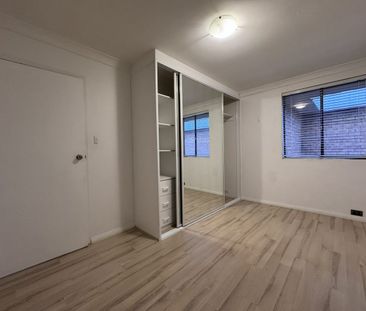 Modern & Convenient 2 Bedroom Unit in Prime Location - Photo 1