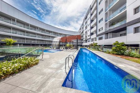 One Bedroom Apartment with Large Balcony in Resort Style Complex - Photo 2