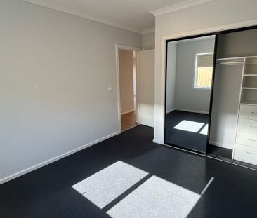 BRAND NEW, TWO LIVING, FOUR BEDROOM HOME IN KINGSTON HAVEN ESTATE - Photo 4