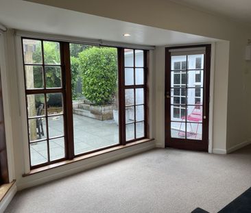 Charming 1-Bedroom Downstairs Apartment - Photo 1