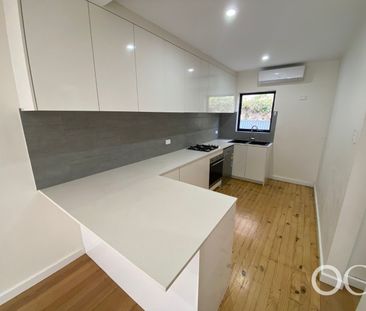 Open the Door to Comfort, Convenience and Courtyard Charm - Photo 3