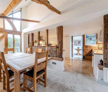 A beautifully converted Grade II listed barn finished to a high sta... - Photo 3