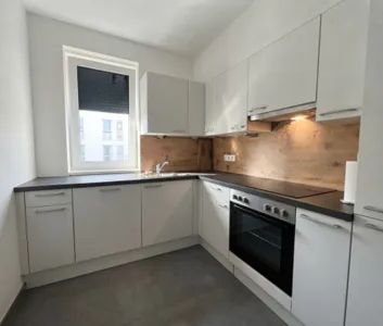 Moderne Wohnung mit Dachterrasse und Schrankraum in exzellenter urbaner Lage! - Foto 2