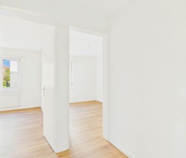 Erstbezug nach Totalsanierung: Stilvolle 4.5-Zimmer-Wohnung mit Top... - Photo 6