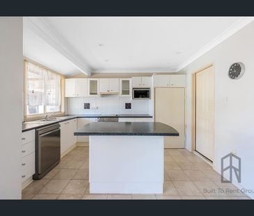 Single level family home with in ground swimming pool - Photo 4