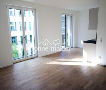 Exklusives Neubau-Apartment im "PURE Living" mit Wasserblick - Foto 1