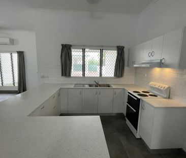 NEAT UNIT IN QUIET COMPLEX CLOSE TO SCHOOLS - Photo 1