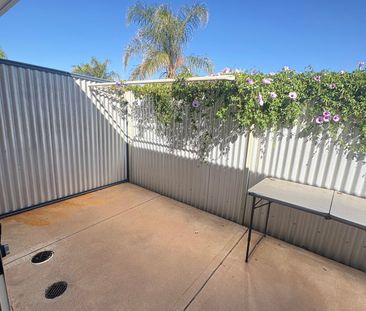 Tidy Unit in a Gated complex with sparkling pool! - Photo 6