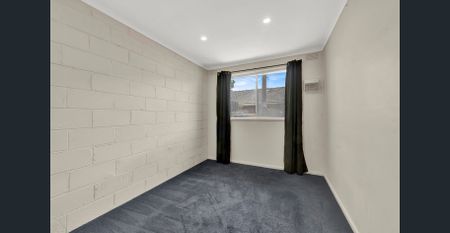 Neat and well-maintained two-bedroom unit - Photo 2