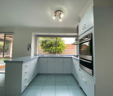 Stylish Family Living in a Prime Location - Photo 1