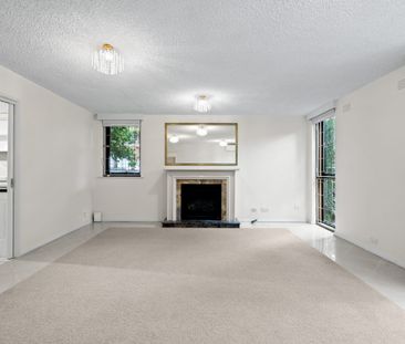 Superbly Located Two Bedroom Apartment With Parking For One Car! - Photo 2