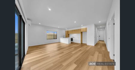 Modern 4-Bedroom Home in a Fantastic Location! - Photo 4