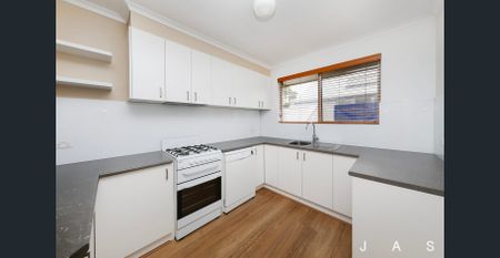 Updated upstairs 2 bedroom unit - Photo 5