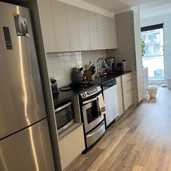 3 1/2 Quartier QB cession de bail juillet 25 à juin 26. Prime de 1,000$ une fois le transfert de ba - Photo 1