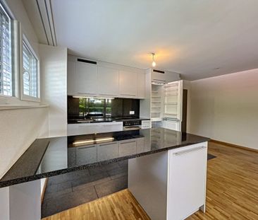 Bel appartement de 2,5 pièces au rez-de-chaussée - Photo 1