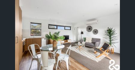 A MUST SEE! Designer Upper-Level Unit in Prime Location - Photo 2