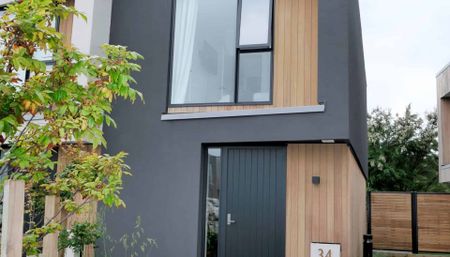 Stylish and Sun-Filled Two-Bedroom Townhouse - Photo 4