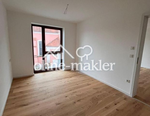 Erstbezug: Moderne 2-Zimmer-Wohnung mit Balkon und EBK zentral in Gangkofen - Foto 1