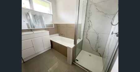 Modern 2 Bedroom Unit - Quiet Area - Photo 3