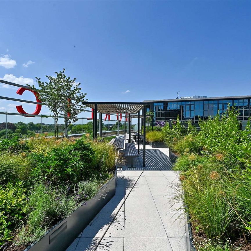 A second floor furnished apartment with south facing private balcony in the sought after Horlicks Artesian House development by Berkeley Homes. - Photo 1