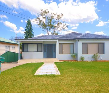 Renovated Family Home with Central Air Conditioning - Photo 1