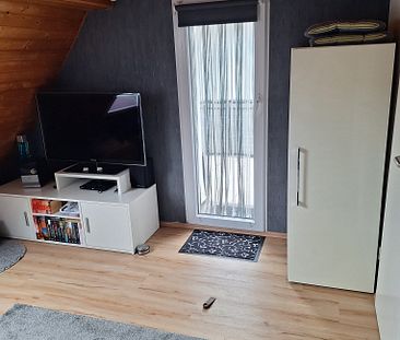 Gemütliche DG-Wohnung mit Dachterrasse - Foto 6