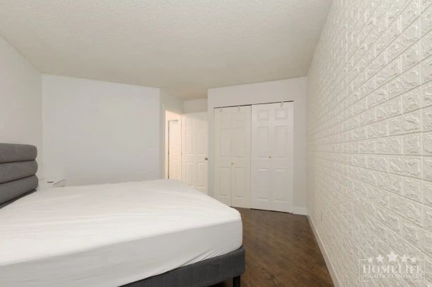 10644 151A St — Modern Ground-Floor 1-Bedroom Suite With Private Patio In Guildford - Photo 1
