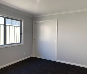 Near-new unit offering low-maintenance living - Photo 1