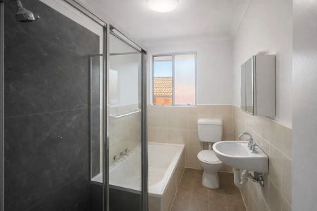 Quiet Top-Floor Living in a Convenient Location - Photo 4