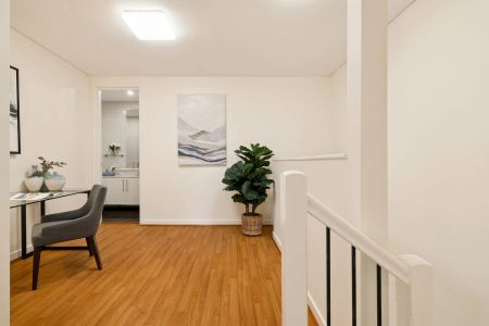Beautifully Presented Dual Level, 'North East' Facing Townhouse Style Family Apartment - Photo 4