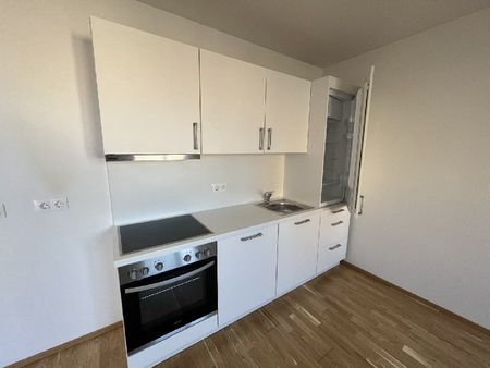 Moderne 1-Zimmer-Wohnung mit Dachterrasse - Foto 5