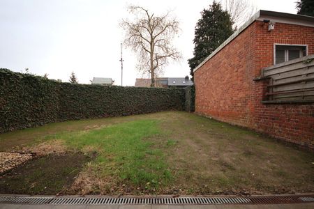 Ruime woning met 3 slaapkamers en tuin midden in het centrum - Photo 4
