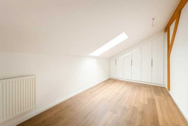 Newly renovated 1.5-room attic apartment with style in Grenchen - Photo 1