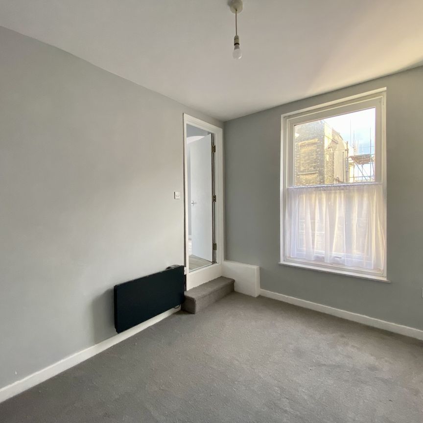 Updated 1st Floor Flat with Glimpses of the Sea! - Photo 1