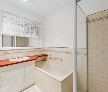 Refreshed Four-Bedroom Home With Gated Side Access - Photo 5