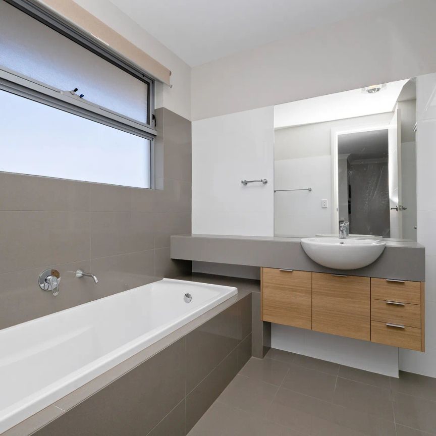 Modern & Low-Maintenance Townhouse for Rent! - Photo 1