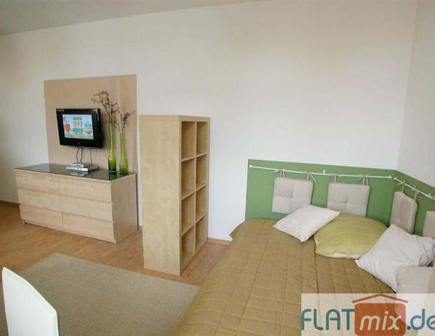FLATmix.de / Modern und hochwertig möbliertes Appartement in BI-Mitte - Photo 1
