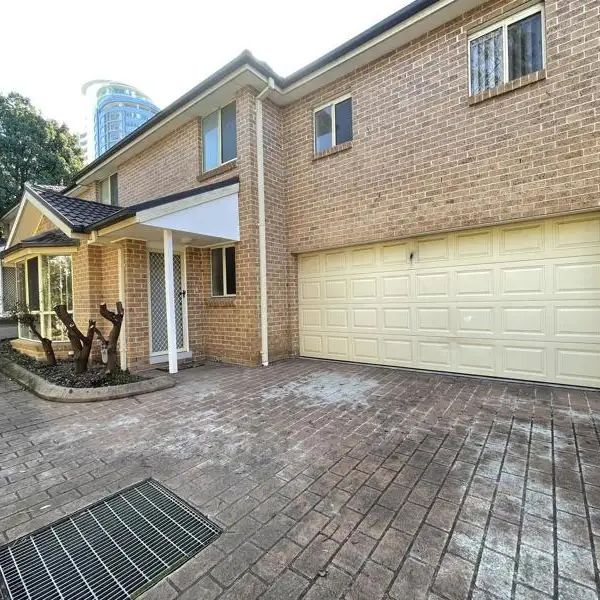 “Newly Renovated Townhouse in Sought After Location!!” - Photo 1