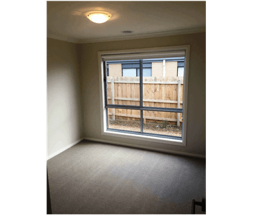 Spacious Family Living with Comfort and Practical Design - Photo 3