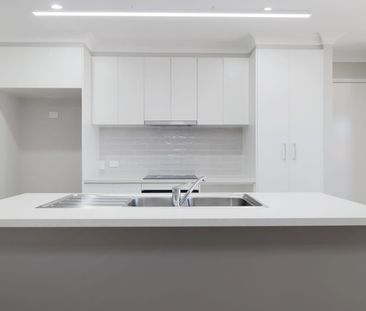 Brand New | Premium Living in the Heart of Newtown - Photo 6