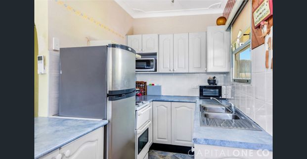 TIDY THREE BEDROOM HOME - Photo 1