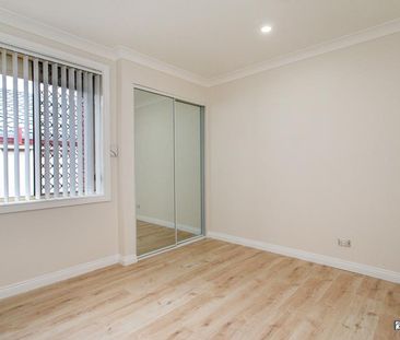 Family Comfort in a Quiet Glenmore Park Cul-de-sac - Photo 3