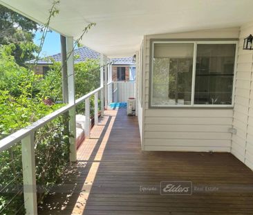 THREE BEDROOM HOME IN TRANQUIL GREEN POINT - Photo 6