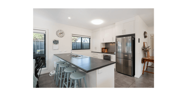 Modern Family Home in a Peaceful Creekside Setting - Photo 1