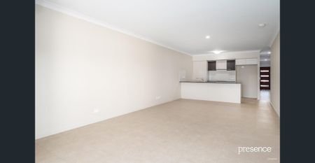 COMFORTABLE DUPLEX LIVING WITH AIR CONDITIONING & GARAGE - Photo 2